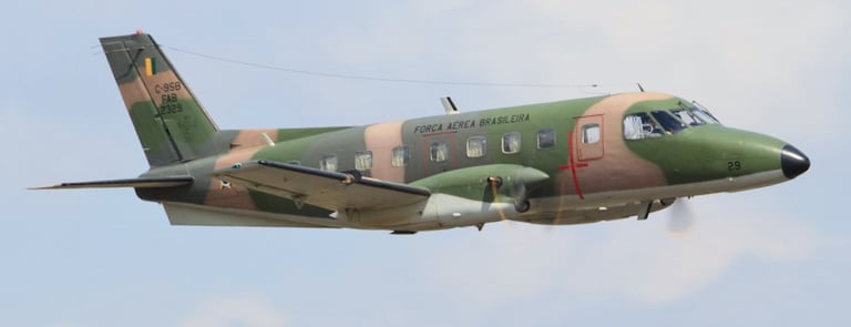 a military plane flying in the sky