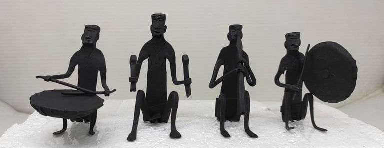 "Handcrafted wrought iron tribal musician figurine set – drummer, percussionist, flutist, and gong player-Shipped worldwide"