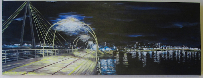 Panoramic view of Southport's Marine Lake at night looking down the historic Pier to the seafront..