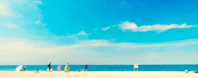 a beach with people standing on the sand