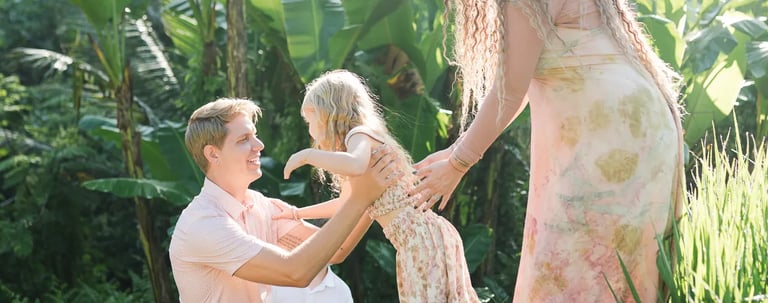 Natural family moment during a rice field photography session in Tegalalang Bali