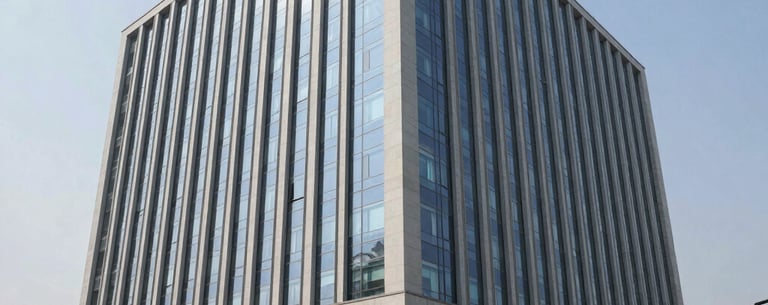 Modern office building exterior in an Indian tech park, sunny day, professional setting.