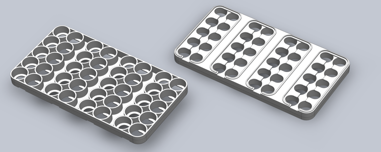 Egg crate end mouldings for constructing lithium ion battery packs
