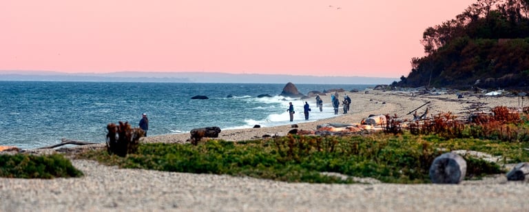 Anglers at sunrise fishing for albies