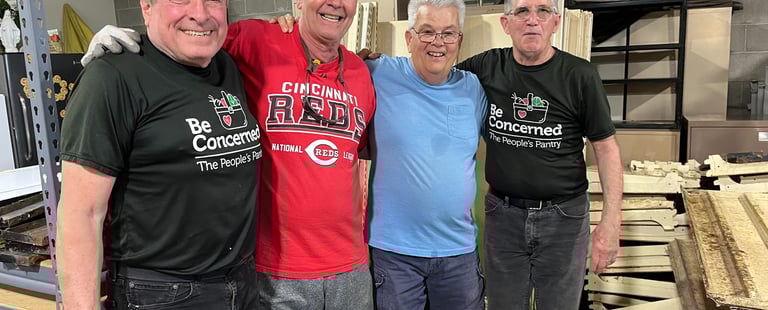 Rose Garden Volunteers working in the warehouse and enjoying each other's company.