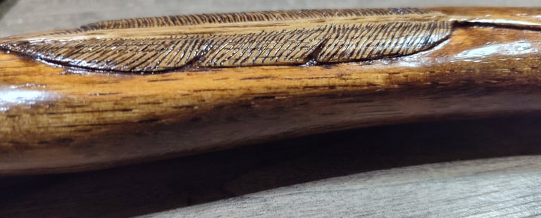 relief carved feather