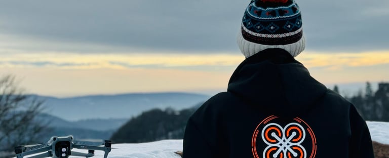 Pilote de drone de dos avec gilet Astral Drones