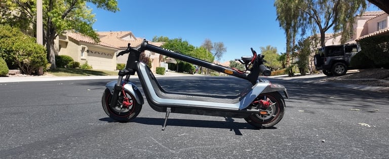 a scooter scooter parked on the street