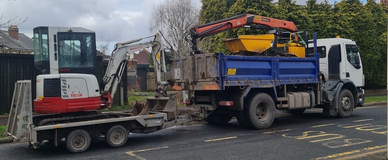 grabber and mini digger on a site in west brom
