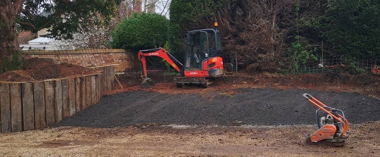 digger and whacker plate in an oldbury garden