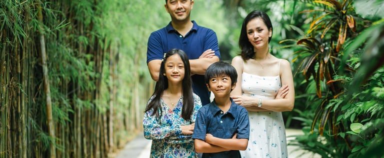 family photography session at Westin Nusa Dua Bali in tropical garden setting