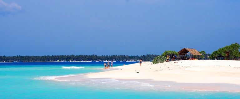 Drink alcohol lounge in white sand beach in tropical island getaway exotic and unique palawan