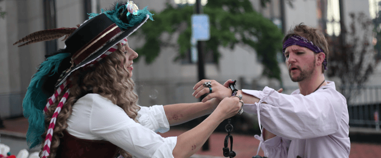 Pirates playing with a bracelet craft