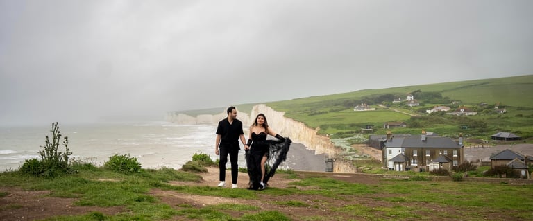 Couple walking along seaside White Cliffs – romantic outdoor photoshoot in Kent by Fred Art Studio