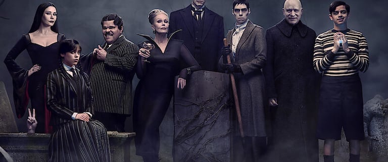 Full cast portrait for Wednesday Season 2, featuring Jenna Ortega, Catherine Zeta-Jones, Luis Guzmán