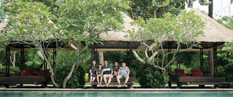 tropical poolside view at Movenpick Jimbaran Bali showing a calm setting for family photography sessions