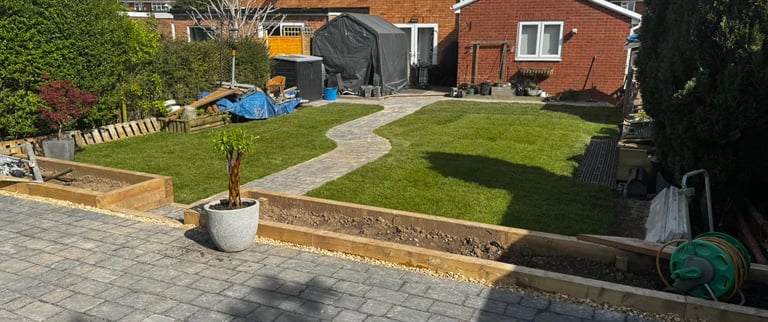 garden path cutting through a lawn in worcester garden
