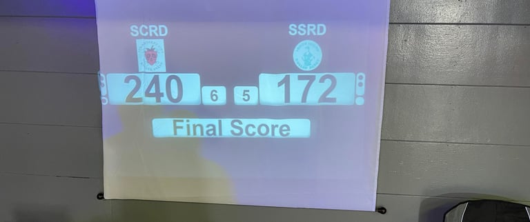 a projection screen showing the score of SCRD last bout. SCRD winning 240 to 172