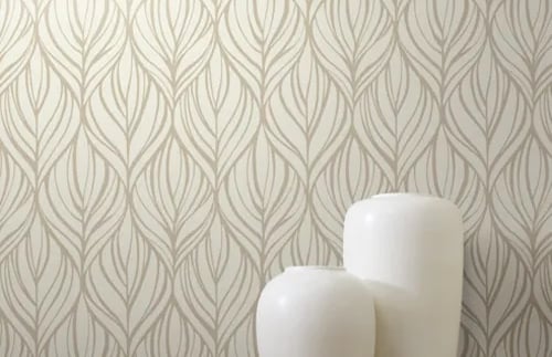 Elegant cream and beige leaf pattern wallpaper behind white ceramic decorative vases on a shelf.