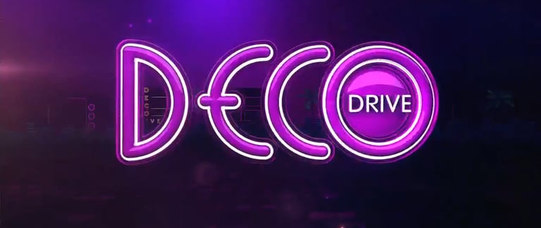 a neon purple neon sign that says disco drive