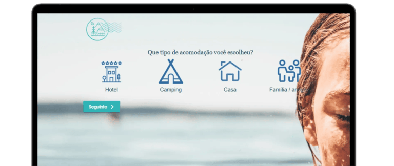 Booking website interface showing accommodation options like hotel, camping, and house on a laptop screen.