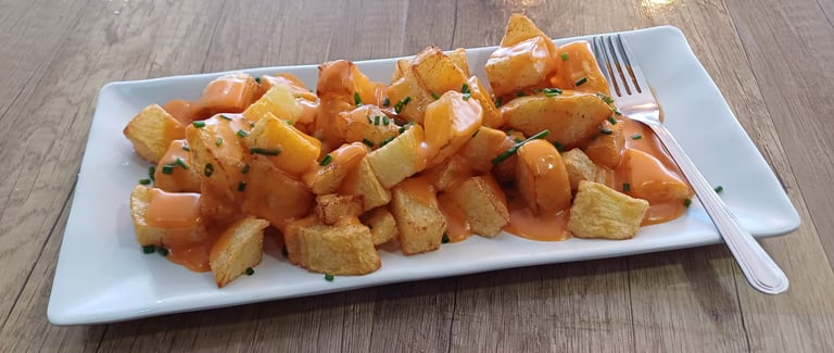 patatas bravas de bar el origen