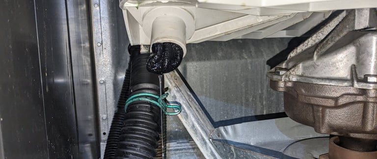 an object is inside a washer drain tubing