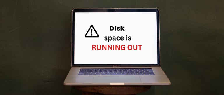 a laptopb screen showing signal on screen that yourdisk space is running out