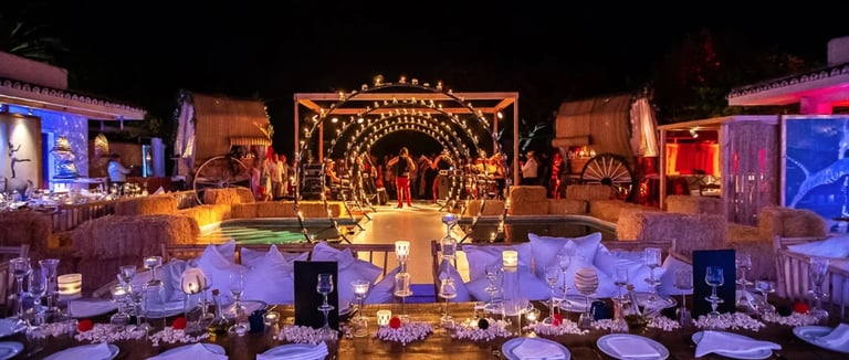 Themed setup with stage and lounge seating