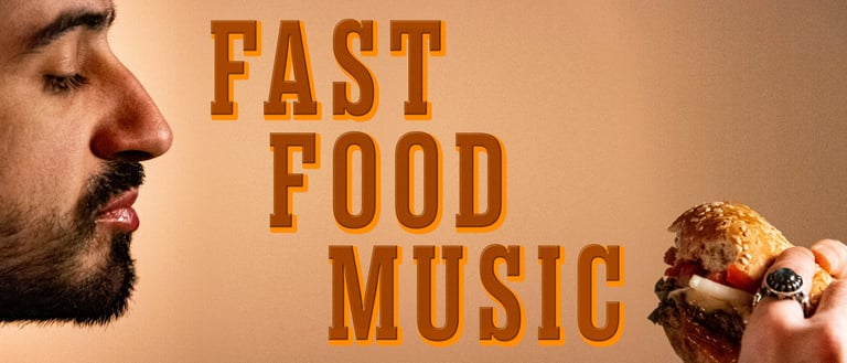 A bearded man gazing at a half-eaten cheeseburger, with a title art reading ‘Fast Food Music’