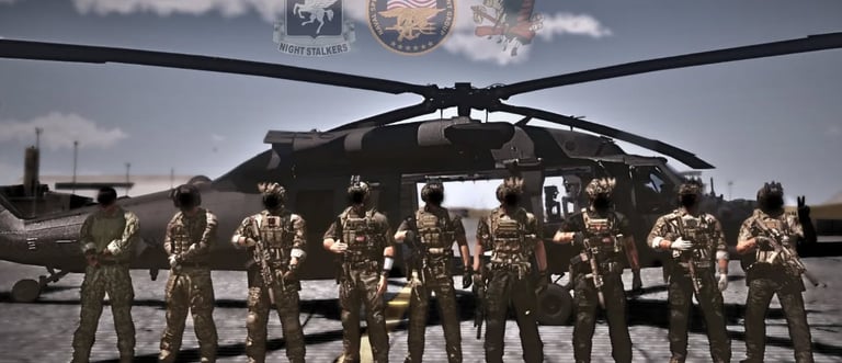 soldati in posa con un elicottero militare dietro le spalle