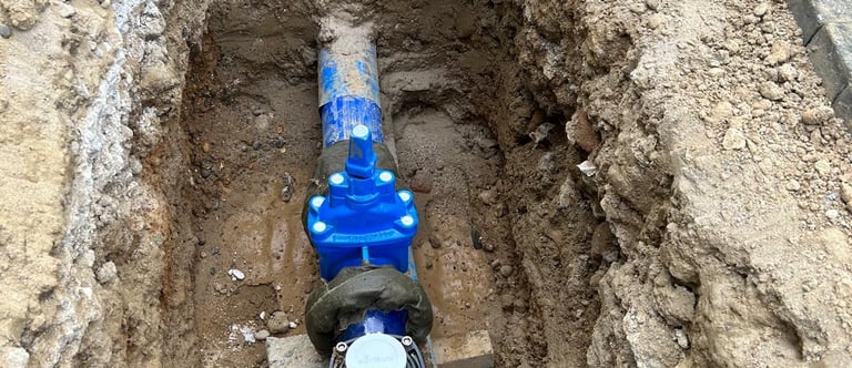 a blue pipe with a blue pipe in the middle of a pipe