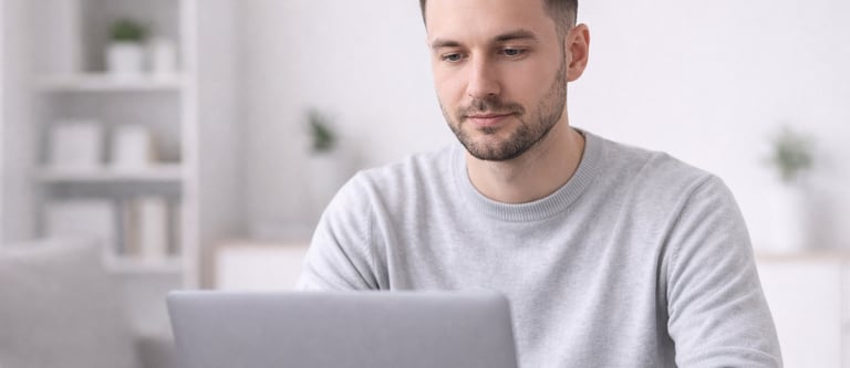 Person calmly reviewing information on a screen representing understanding of credit data systems