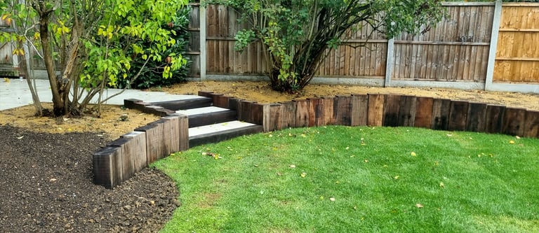 800m2 Full Garden Remodel Curved Sleeper Retaining Wall Planters, Lawn & Split-face Tiled Wall Step
