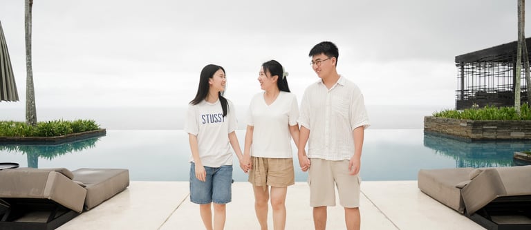 Family walking naturally during session at Alila Villas Uluwatu Bali with relaxed interaction