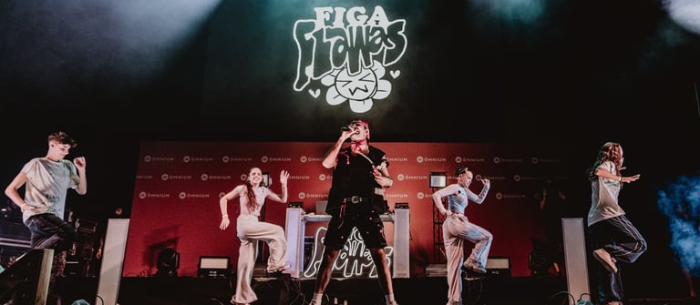 a group of people standing on a stage