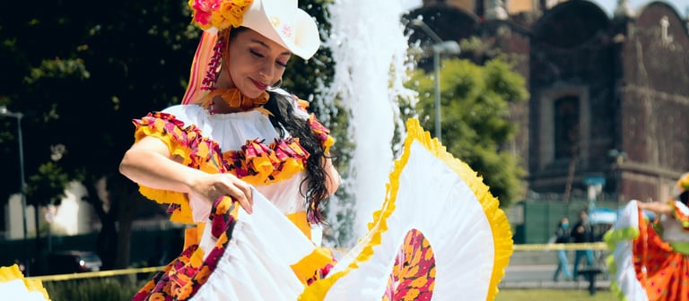 a woman in a dress with a white dress and a yellow dress