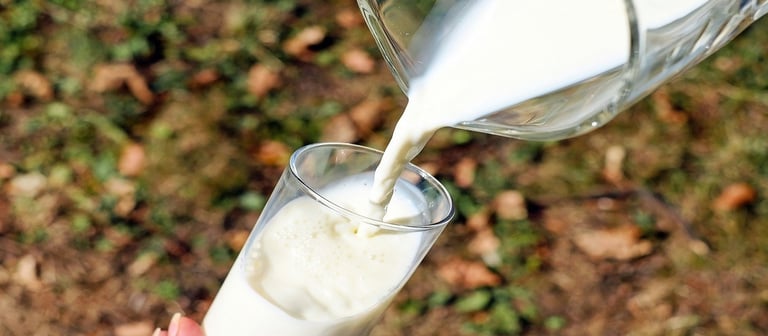 Milk pouring in Glass