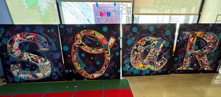 SOAR mural completed during residency with Arturo Ho at Henderson-Hopkins