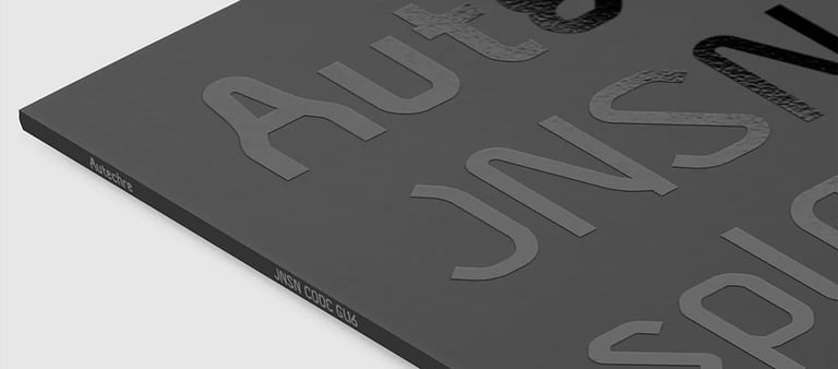 Minimalist black vinyl record sleeve featuring embossed Autechre JNSN CODE GL16 text.