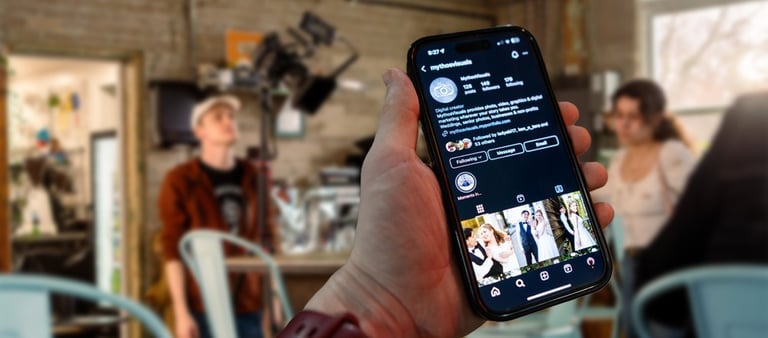 a person holding a cell phone in their hand