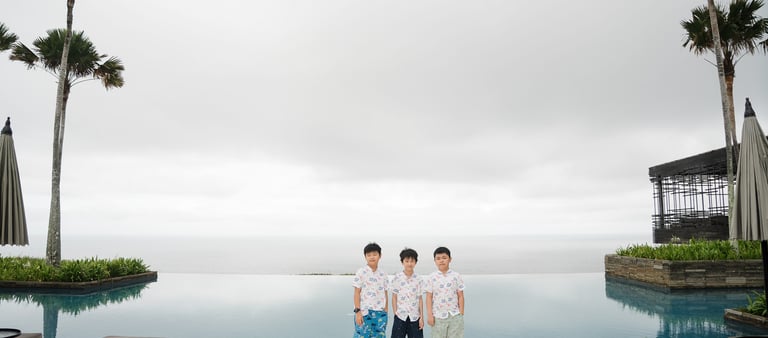 Children portrait in minimal architectural setting at Alila Villas Uluwatu Bali with soft natural light