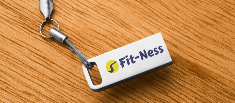 Guide de style de marque montrant une clé USB personnalisée avec logo d'un coach fitness.