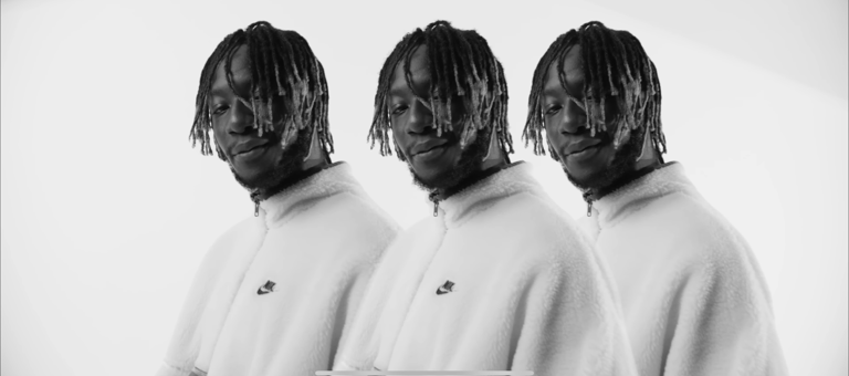 a man with dreadlocks and dreadlocks on his head