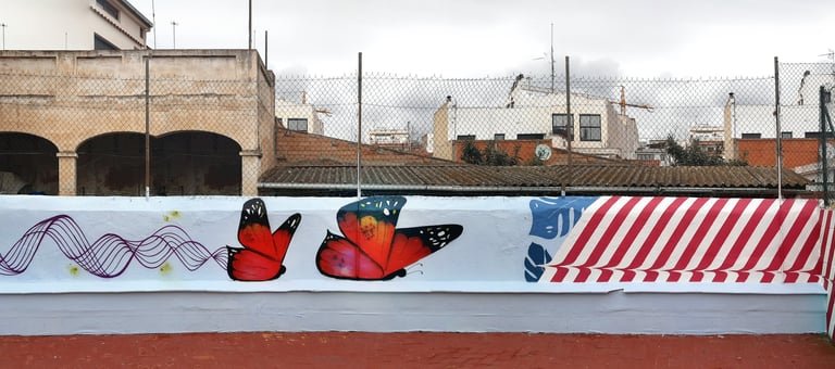 graffiti mural escuela mariposas colores