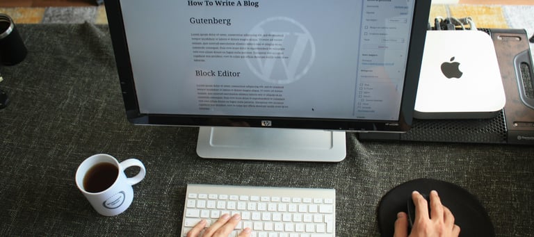 A restuarant owner writing a blog pot for their website.
