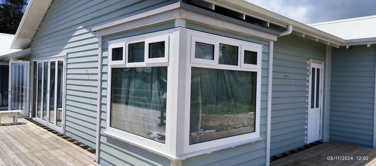 New build window and door installation for Auckland residential construction project, New Zealand