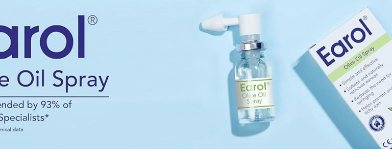 a bottle of Earol olive oil spray on a blue background