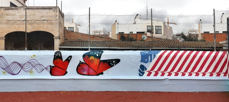 graffiti mural escuela mariposas colores