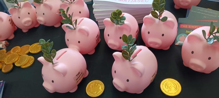 The Simple Budget Piggy Banks with gold coins